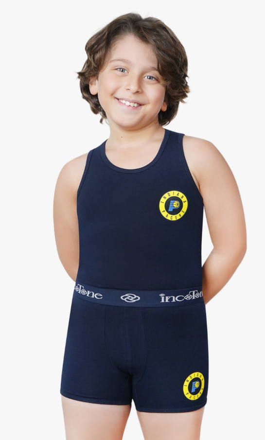 Child wearing a navy blue swim outfit with logos on a white background
