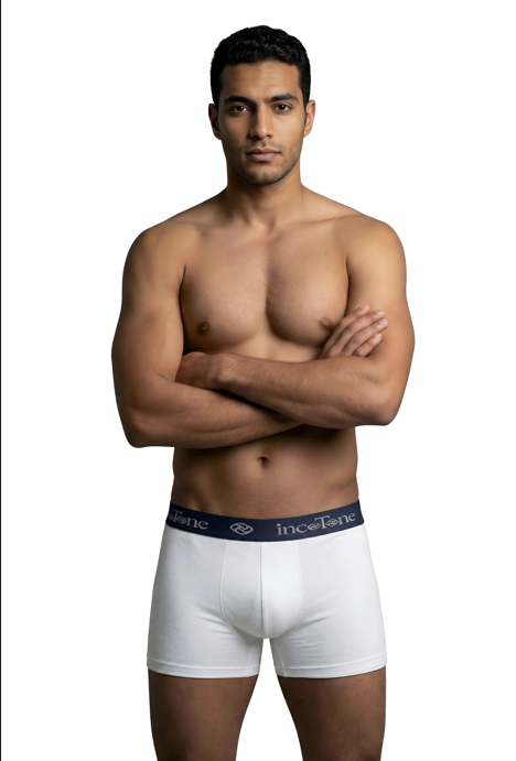 Man wearing white boxer with blue waistband on a white background