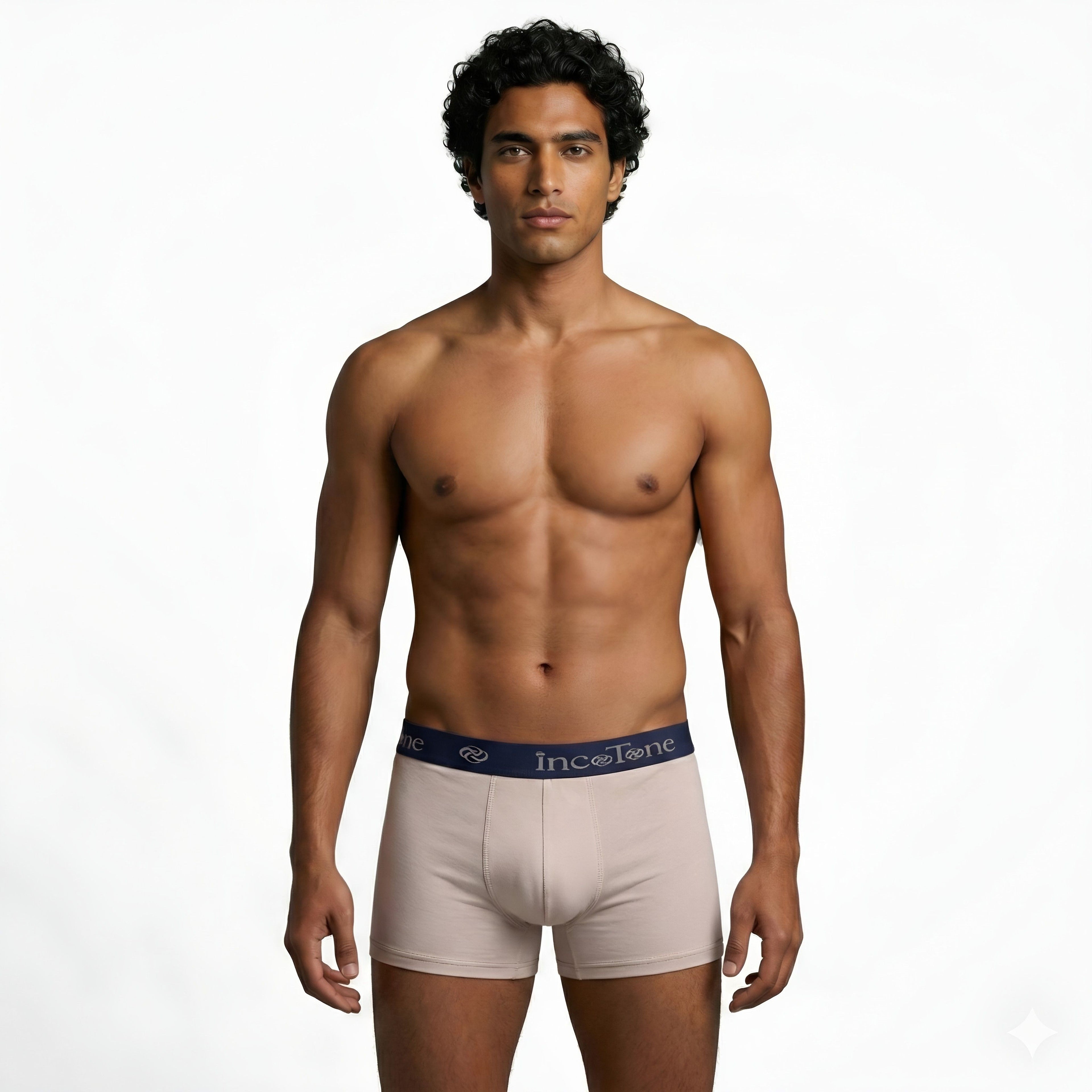 Man wearing beige underwear with a visible brand logo on a white background